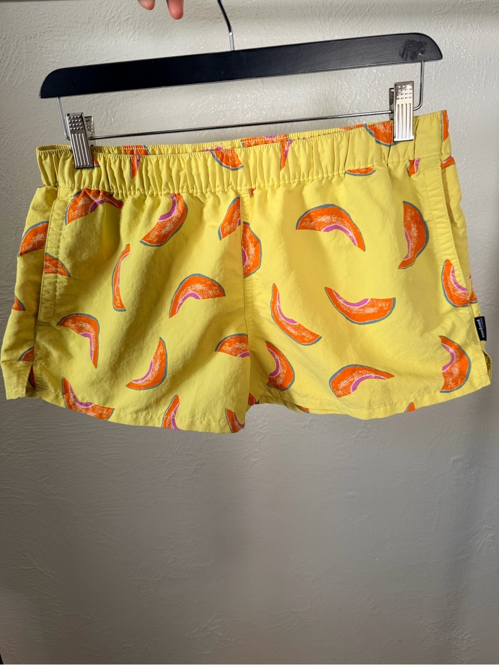 Patagonia Women's Barely Baggies Shorts in a yellow melon cantaloupe Size Medium